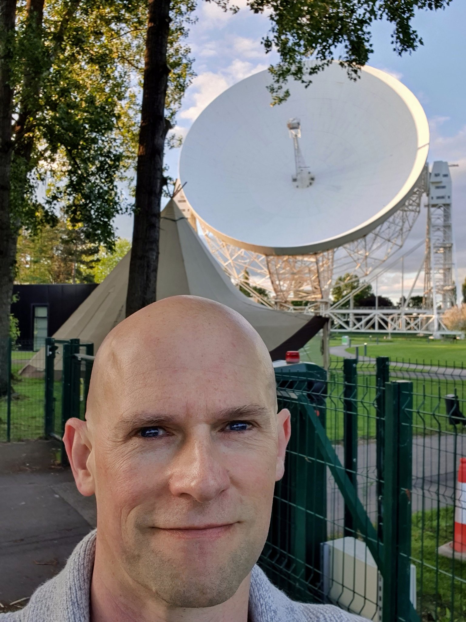 Eamonn Kerins in front of the Lovell Telescope at Jodrell Bank