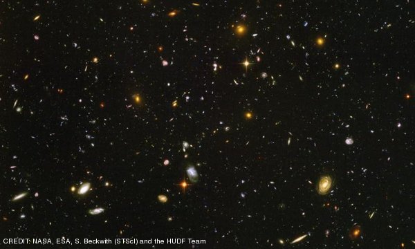 Part of the Hubble Ultra Deep Field, an 11-day exposure by the Hubble Space Telescope in visible and infrared light, looking back up to 13 billion years into the past and showing a small patch of sky containing around 10,000 galaxies. CREDIT: NASA, ESA, S. Beckwith (STScI) and the HUDF Team March 2012 Extra