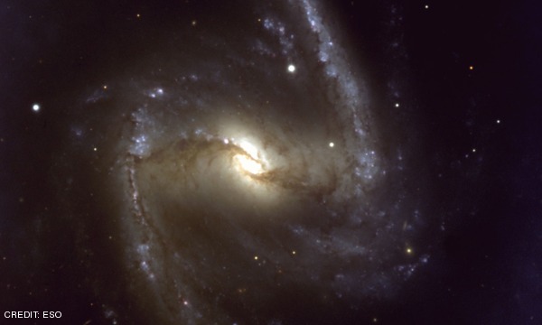 A true-colour image of the major part of NGC 1365, combined from three exposures with the FORS1 multi-mode instrument at VLT UT1, in the B (blue), V (green) and R (red) optical bands. CREDIT: ESO March 2013