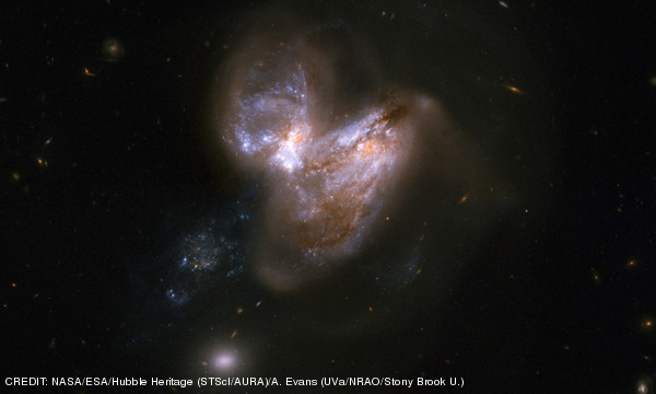 The peculiar galaxy Arp 299 seen by the Hubble telescope.It is the result of the collision and merger of two spiral galaxies; several supernovae can be found here. CREDIT: NASA/ESA/Hubble Heritage (STScI/AURA)/A. Evans (UVa/NRAO/Stony Brook U.) March 2014