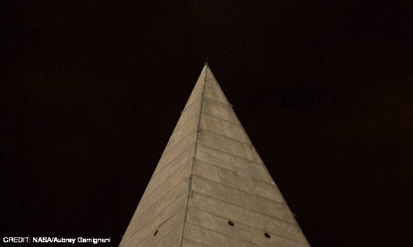 A perigree full moon seen behind the Washington Monument during the total lunar eclipse of September 2015. CREDIT: NASA/Aubrey Gemignani October 2015