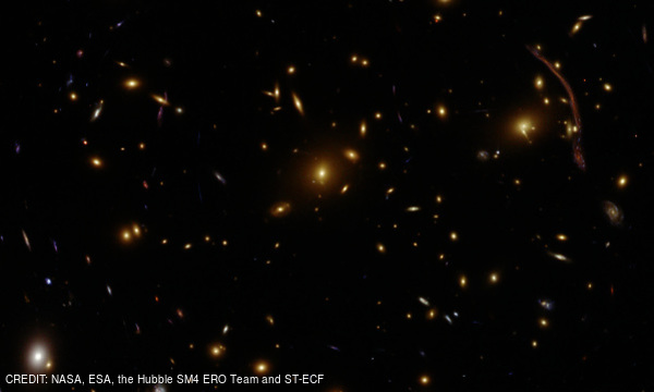 Image of a galaxy cluster (Abell 370) showing lensing CREDIT: NASA, ESA, the Hubble SM4 ERO Team and ST-ECF November 2019