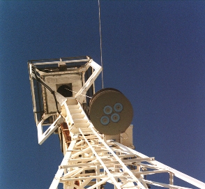 The multibeam
 receiver being hoisted into the Lovell telescope focus box